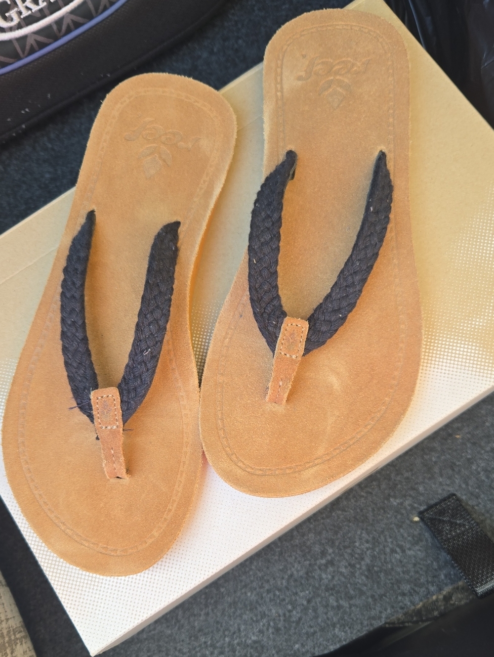 Reef Women’s Tan Suede Flip Flops with Black Braided Straps